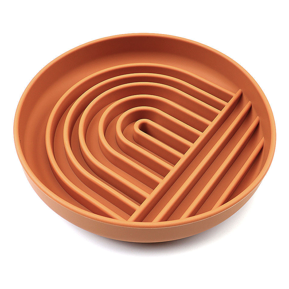 Red silicone slow feeder bowl with raised ridges to slow eating