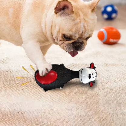 French Bulldog playing with a squeaky latex cow toy